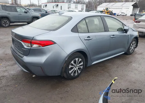 2021 Toyota Corolla Hybrid Le from USA, damaged, VIN JTDEAMDE9MJ015841
